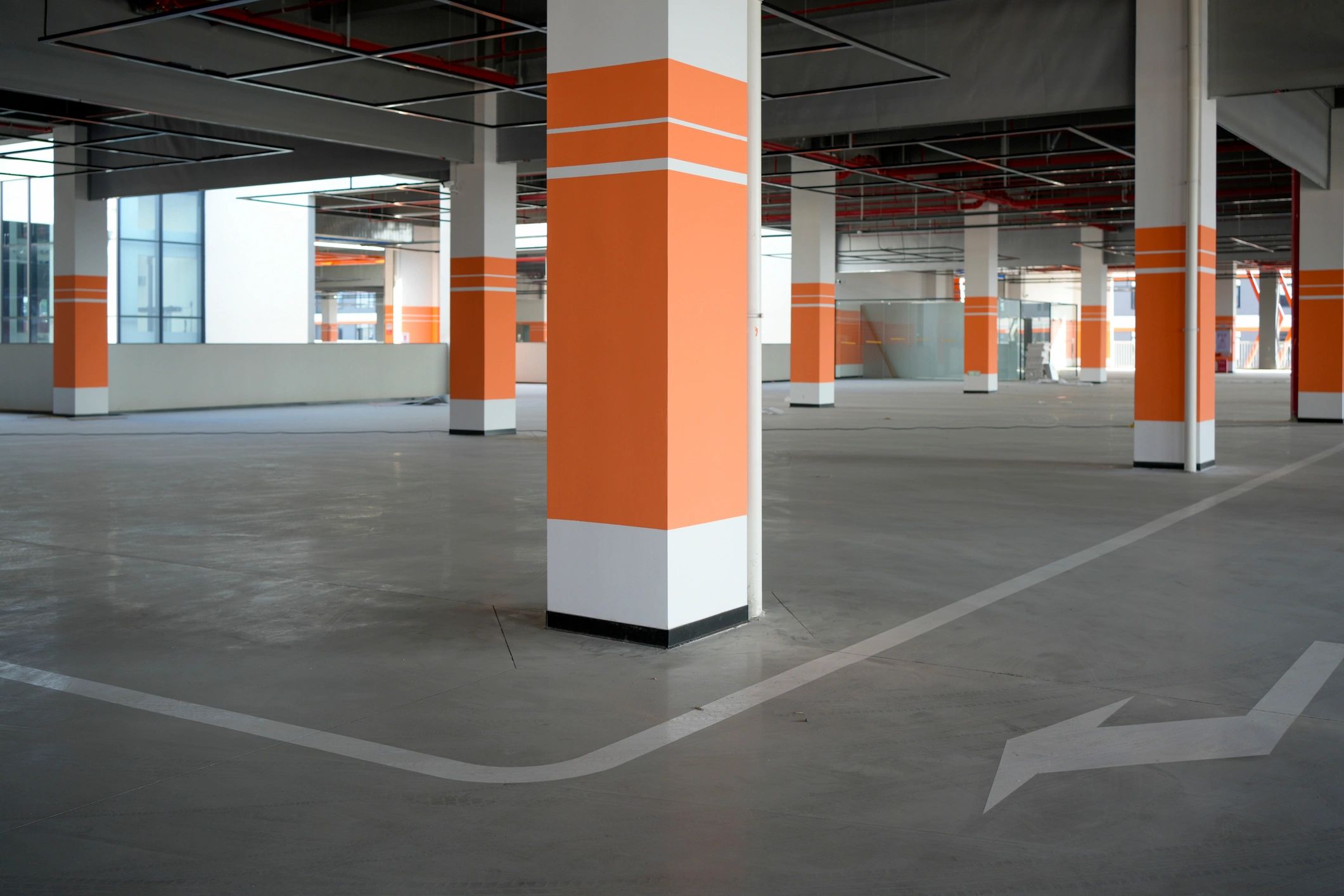Large garage structure with smooth coated concrete floor
